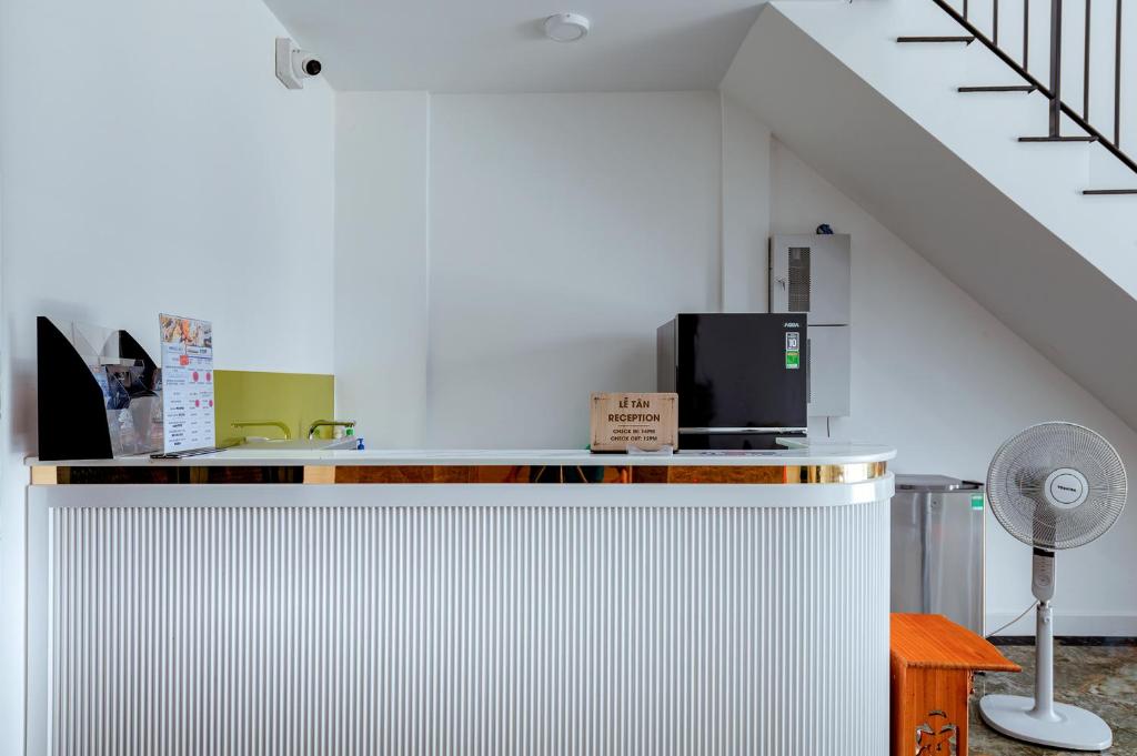 Thiet-ke-quay-le-tan-Boutique-Hotel-toi-uu-check-in-6